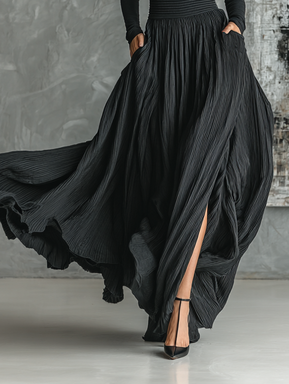 Conjunto de moda femenina en negro con camiseta de cuello alto ajustada y falda plisada MDA1366H1Y