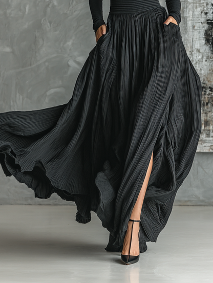 Conjunto de moda femenina en negro con camiseta de cuello alto ajustada y falda plisada MDA1366H1Y